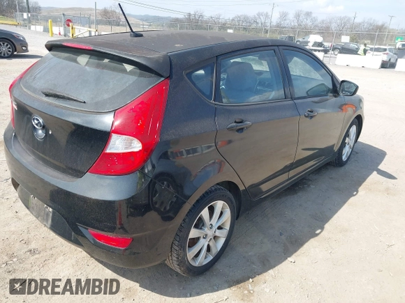 2012 Hyundai Accent SE with VIN KMHCU5AE8CU015055, listed as a IAAI auction lot 41814610 with 141,769 mi miles. Bid and sale history available at carsss.com. Image 4.