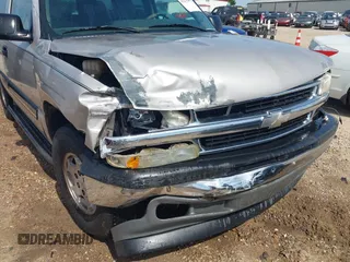 2005 Chevrolet Tahoe LT z VIN 1GNEC13T25J147583, wystawiony jako IAAI lot #42275971 z przebiegiem 244 307 mil mil oraz . Historia ofert i sprzedaży dostępna na DreamBid. Obrazek 6.
