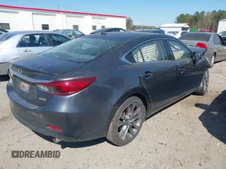 2016 Mazda Mazda6 i Grand Touring with VIN JM1GJ1W56G1432116, listed as a IAAI auction lot 41888066 with 124,182 mi miles. Bid and sale history available at carsss.com. Image 4.