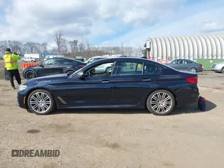 2018 BMW 5 Series M550i xDrive with VIN WBAJB9C52JB035930, listed as a IAAI auction lot 41674415 with 56,294 mi miles and . Bid and sale history available at DreamBid. Image 14.