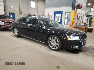 2014 Audi A8 3.0T z VIN WAURGAFD1EN009932, wystawiony jako Copart lot #84607914 z przebiegiem 87 981 mil mil oraz Szkoda całkowita • Salvage title. Historia ofert i sprzedaży dostępna na DreamBid. Obrazek 4.