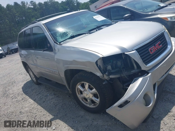 2004 GMC Envoy SLT with VIN 1GKDS13S742230325, listed as a IAAI auction lot 42385113 with 177,989 mi miles and . Bid and sale history available at DreamBid. Image 1.