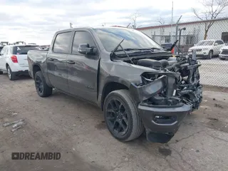 2023 Ram 1500 Laramie with VIN 1C6SRFJT3PN573439, listed as a IAAI auction lot 41423759 with 18,128 mi miles and . Bid and sale history available at DreamBid. Image 1.