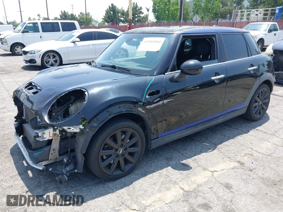 2015 MINI Hardtop 4 Door S with VIN WMWXU3C58F2B66601, listed as a IAAI auction lot 42444404 with 76,174 mi miles and . Bid and sale history available at DreamBid. Image 19.