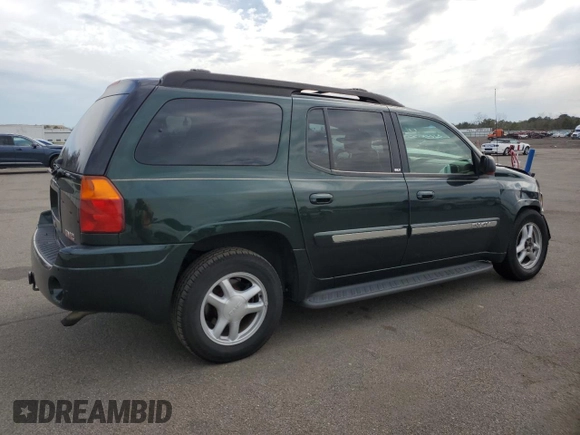 2003 GMC Envoy SLT z VIN 1GKET16P936191818, wystawiony jako Copart lot #53270645 z przebiegiem 130 357 mil mil oraz Szkody całkowita. Historia ofert i sprzedaży dostępna na DreamBid. Obrazek 3.