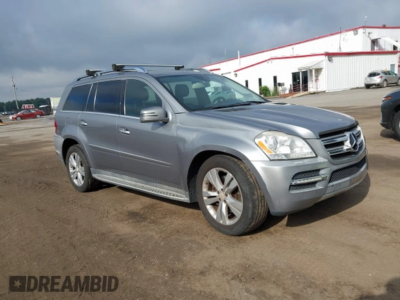 2012 Mercedes-Benz GL 450 z VIN 4JGBF7BEXCA766840, wystawiony jako IAAI lot #42521600 z przebiegiem 154 811 mil mil oraz . Historia ofert i sprzedaży dostępna na DreamBid. Obrazek 1.