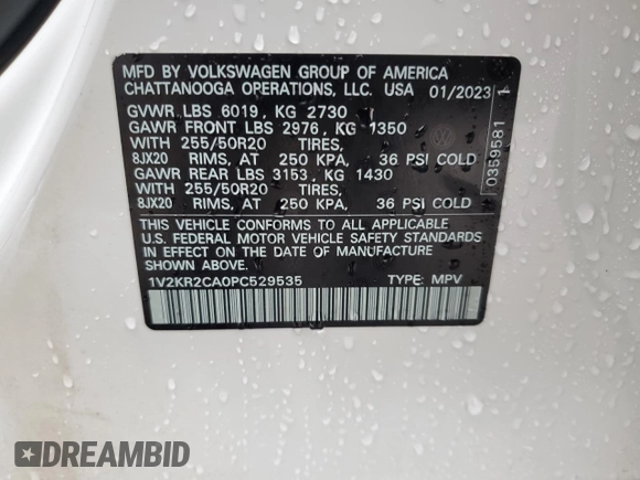 2023 Volkswagen Atlas SE z VIN 1V2KR2CA0PC529535, wystawiony jako Copart lot #55973775 z przebiegiem 23 476 mil mil oraz Czysty tytuł • Clean title. Historia ofert i sprzedaży dostępna na DreamBid. Obrazek 13.