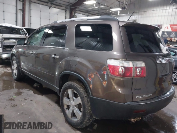 2011 GMC Acadia SLT1 with VIN 1GKKRREDXBJ331099, listed as a IAAI auction lot 41950066 with 128,067 mi miles. Bid and sale history available at carsss.com. Image 3.