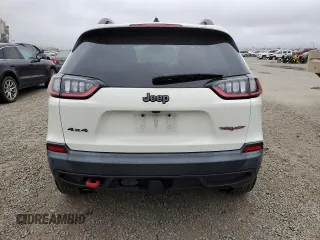 2019 Jeep Cherokee Trailhawk z VIN 1C4PJMBX0KD127324, wystawiony jako Copart lot #50821445 z przebiegiem 88 604 mil mil oraz Szkoda całkowita • Salvage title. Historia ofert i sprzedaży dostępna na DreamBid. Obrazek 6.