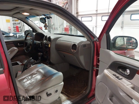2005 GMC Envoy SLT with VIN 1GKDT13S352324863, listed as a IAAI auction lot 41707649 with 247,326 mi miles. Bid and sale history available at carsss.com. Image 5.