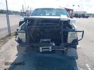 2013 Ford F-150 XL с VIN 1FTFW1EF1DKD91441, выставлен на аукционе IAAI как лот 42307232 с пробегом 155 041 миль миль и . История ставок и продаж доступна на DreamBid. Изображение 12.