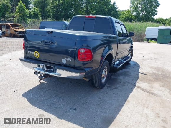 2001 Ford F-150 XLT with VIN 1FTRW08L71KC63676, listed as a IAAI auction lot 42536000 with 326,699 mi miles and . Bid and sale history available at DreamBid. Image 4.