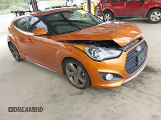2014 Hyundai Veloster Turbo with VIN KMHTC6AE2EU211410, listed as a IAAI auction lot 42616378 with 91,552 mi miles and . Bid and sale history available at DreamBid. Image 1.