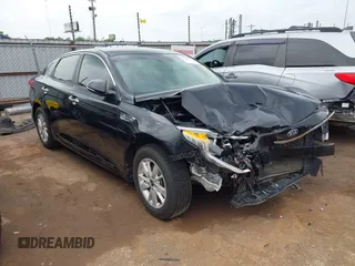 2018 Kia Optima LX z VIN 5XXGT4L35JG212637, wystawiony jako IAAI lot #42135452 z przebiegiem 101 180 mil mil oraz . Historia ofert i sprzedaży dostępna na DreamBid. Obrazek 1.