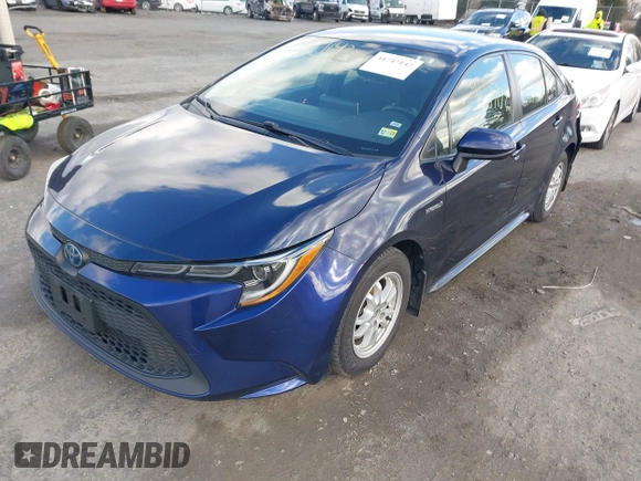 2021 Toyota Corolla Hybrid LE with VIN JTDEAMDE9MJ021431, listed as a IAAI auction lot 41747142 with 165,680 mi miles. Bid and sale history available at carsss.com. Image 2.