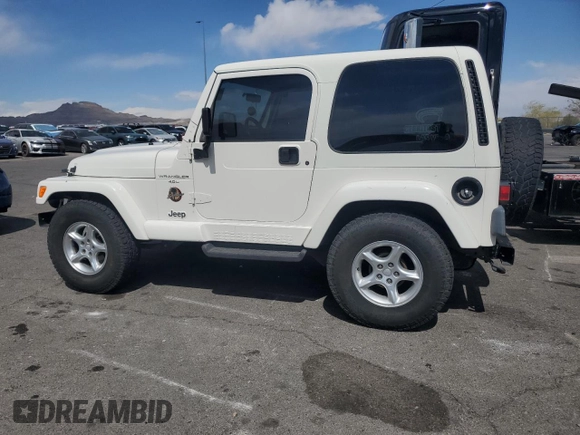2000 Jeep Wrangler Sahara with VIN 1J4FA59S6YP790541, listed as a Copart auction lot 53837885 with 137,827 mi miles and Salvage title. Bid and sale history available at DreamBid. Image 2.