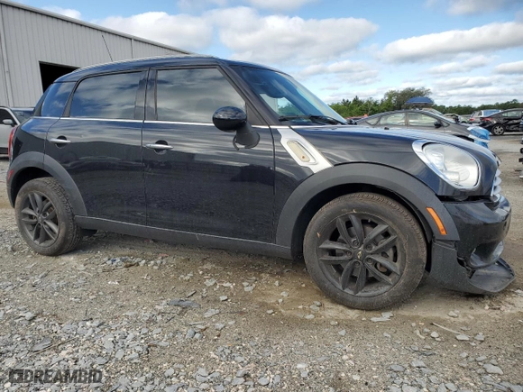 2013 MINI Cooper Countryman with VIN WMWZB3C58DWM07395, listed as a Copart auction lot 52193165 with 147,892 mi miles and Salvage Title. Bid and sale history available at carsss.com. Image 4.