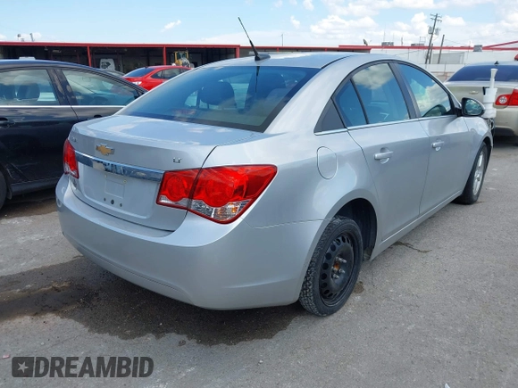 2014 Chevrolet Cruze 1LT with VIN 1G1PC5SB8E7410649, listed as a IAAI auction lot 42582375 with 228,772 mi miles and . Bid and sale history available at DreamBid. Image 4.