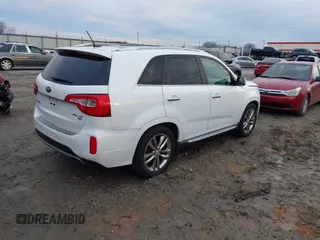 2014 Kia Sorento SX with VIN 5XYKW4A70EG451120, listed as a IAAI auction lot 41309727 with 106,262 mi miles. Bid and sale history available at carsss.com. Image 4.