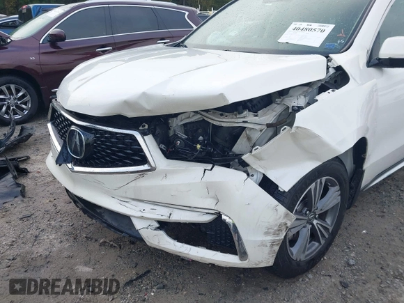 2019 Acura MDX z VIN 5J8YD3H37KL005867, wystawiony jako IAAI lot #40480570 z przebiegiem 89 867 mil mil oraz . Historia ofert i sprzedaży dostępna na DreamBid. Obrazek 6.