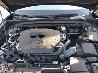 2024 Mazda CX-30 S Preferred with VIN 3MVDMBCM0RM669099, listed as a IAAI auction lot 41864473 with 6,278 mi miles and . Bid and sale history available at DreamBid. Image 10.