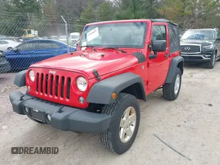 2015 Jeep Wrangler Sport with VIN 1C4GJWAGXFL686842, listed as a IAAI auction lot 42040058 with 154,091 mi miles. Bid and sale history available at carsss.com. Image 20.