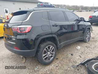 2017 Jeep Compass Latitude with VIN 3C4NJDBB7HT640200, listed as a IAAI auction lot 41963507 with 113,328 mi miles and . Bid and sale history available at carsss.com. Image 4.