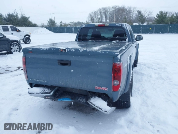 2006 GMC Canyon SLE Z71 z VIN 1GTDS196568168235, wystawiony jako IAAI lot #41399545 z przebiegiem 119 533 mil mil oraz . Historia ofert i sprzedaży dostępna na DreamBid. Obrazek 4.