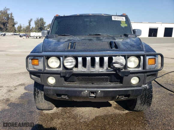 2003 Hummer H2 with VIN 5GRGN23U73H120330, listed as a Copart auction lot 69191714 with 0 mi miles and Clean Title. Bid and sale history available at carsss.com. Image 5.