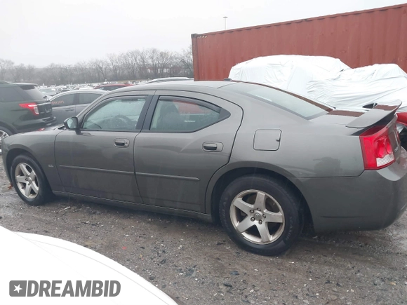 2009 Dodge Charger SXT with VIN 2B3KA33V59H573761, listed as a IAAI auction lot 41545196 with 172,065 mi miles and . Bid and sale history available at carsss.com. Image 14.