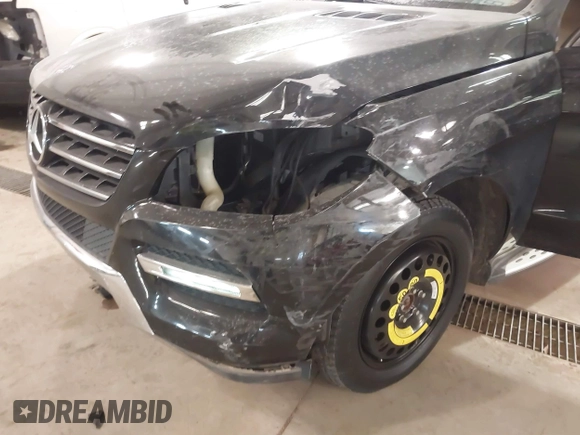 2014 Mercedes-Benz M 350 with VIN 4JGDA5HB5EA412462, listed as a IAAI auction lot 41328771 with 160,856 mi miles and . Bid and sale history available at carsss.com. Image 6.