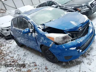 2014 Toyota Yaris L with VIN JTDKTUD34ED581773, listed as a IAAI auction lot 41620586 with 239,100 mi miles. Bid and sale history available at carsss.com. Image 1.