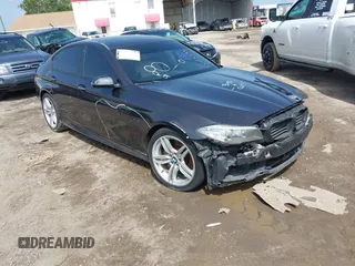 2014 BMW 5 Series 535i with VIN WBA5B1C5XED477531, listed as a IAAI auction lot 42405293 with 104,256 mi miles and . Bid and sale history available at DreamBid. Image 1.