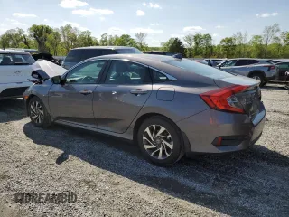 2018 Honda Civic EX with VIN 19XFC2F76JE027598, listed as a Copart auction lot 52301385 with 128,854 mi miles and Salvage Title. Bid and sale history available at DreamBid. Image 2.