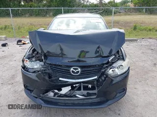 2016 Mazda Mazda6 i Touring with VIN JM1GJ1V53G1431880, listed as a IAAI auction lot 42079970 with 111,179 mi miles. Bid and sale history available at carsss.com. Image 12.