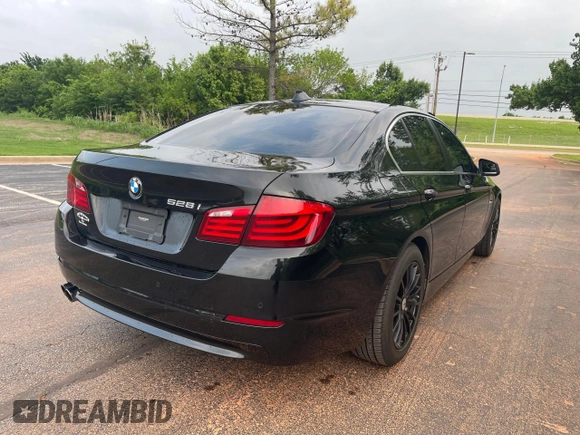 2013 BMW 5 Series 528i with VIN WBAXG5C55DDY31245, listed as a Copart auction lot 54993245 with 118,760 mi miles and Clean Title. Bid and sale history available at carsss.com. Image 4.