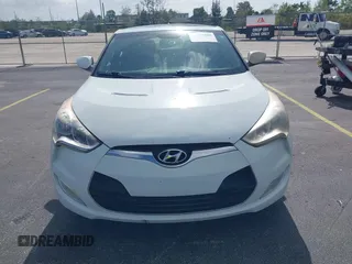 2013 Hyundai Veloster w/Gray Int with VIN KMHTC6AD0DU150516, listed as a IAAI auction lot 42164880 with 122,841 mi miles and . Bid and sale history available at DreamBid. Image 6.