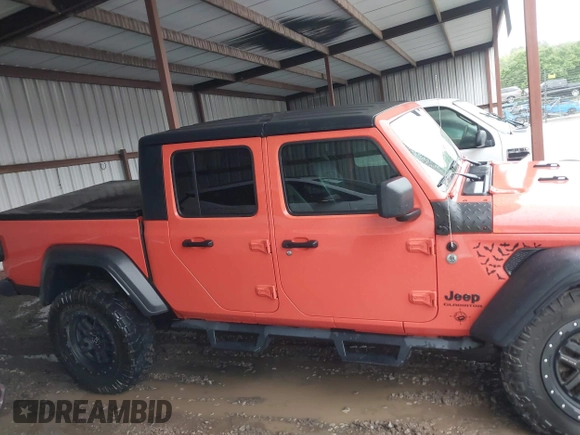 2020 Jeep Gladiator Sport S with VIN 1C6JJTAG4LL177711, listed as a IAAI auction lot 42222877 with 45,462 mi miles and . Bid and sale history available at DreamBid. Image 13.