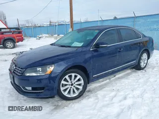 2013 Volkswagen Passat SEL Premium z VIN 1VWCP7A32DC089517, wystawiony jako IAAI lot #41546511 z przebiegiem 149 067 mil mil oraz . Historia ofert i sprzedaży dostępna na DreamBid. Obrazek 2.