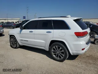 2017 Jeep Grand Cherokee Overland with VIN 1C4RJECGXHC868236, listed as a Copart auction lot 72374654 with 99,528 mi miles and Salvage Title. Bid and sale history available at carsss.com. Image 2.