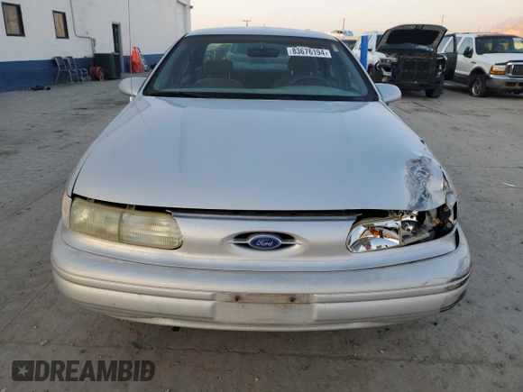 1995 Ford Taurus GL with VIN 1FALP52U5SA320424, listed as a Copart auction lot 83676194 with 177,817 mi miles and Salvage title. Bid and sale history available at DreamBid. Image 5.