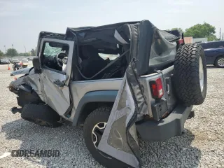 2013 Jeep Wrangler Sport with VIN 1C4AJWAG0DL696928, listed as a Copart auction lot 60822915 with 169,503 mi miles and Salvage title. Bid and sale history available at DreamBid. Image 2.