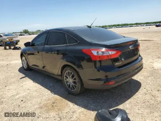 2014 Ford Focus SE with VIN 1FADP3F20EL113398, listed as a Copart auction lot 53658335 with 83,729 mi miles and Salvage Title. Bid and sale history available at carsss.com. Image 2.