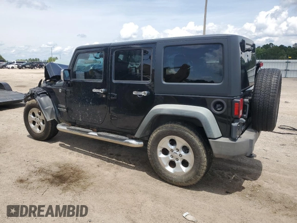2012 Jeep Wrangler Unlimited Sport z VIN 1C4BJWDG4CL243538, wystawiony jako Copart lot #58826675 z przebiegiem 126 646 mil mil oraz Szkoda całkowita • Salvage title. Historia ofert i sprzedaży dostępna na DreamBid. Obrazek 2.