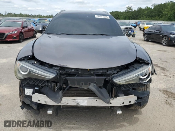 2018 Alfa Romeo Stelvio z VIN ZASFAKANXJ7C19707, wystawiony jako Copart lot #56553175 z przebiegiem 67 757 mil mil oraz Tytuł czysty. Historia ofert i sprzedaży dostępna na DreamBid. Obrazek 5.