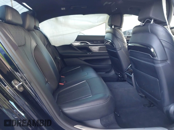 2019 BMW 7 Series 740i with VIN WBA7E2C58KB218419, listed as a IAAI auction lot 41831080 with 97,752 mi miles and . Bid and sale history available at DreamBid. Image 8.