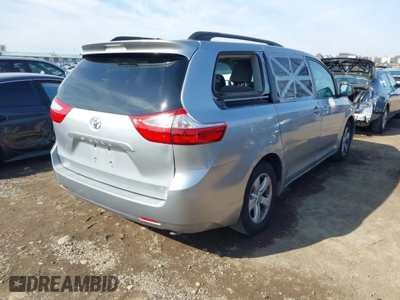 2016 Toyota Sienna LE AAS with VIN 5TDKK3DC2GS750211, listed as a IAAI auction lot 41444073 with 120,185 mi miles and . Bid and sale history available at DreamBid. Image 4.