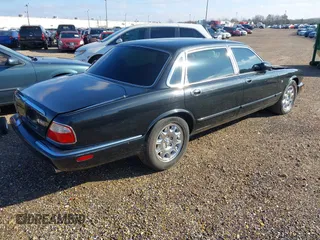 2000 Jaguar XJ with VIN SAJDA23C5YLF19267, listed as a IAAI auction lot 40899052 with 92,553 mi miles and . Bid and sale history available at DreamBid. Image 4.