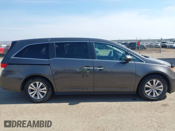2014 Honda Odyssey EX-L z VIN 5FNRL5H64EB031426, wystawiony jako IAAI lot #41777542 z przebiegiem 162 426 mil mil oraz . Historia ofert i sprzedaży dostępna na DreamBid. Obrazek 13.