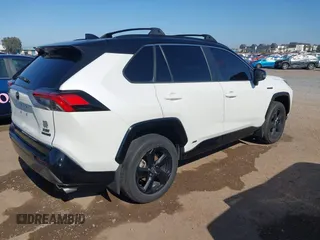 2021 Toyota RAV4 Hybrid XSE with VIN 4T3E6RFV3MU042773, listed as a IAAI auction lot 42000073 with 55,110 mi miles and . Bid and sale history available at DreamBid. Image 4.